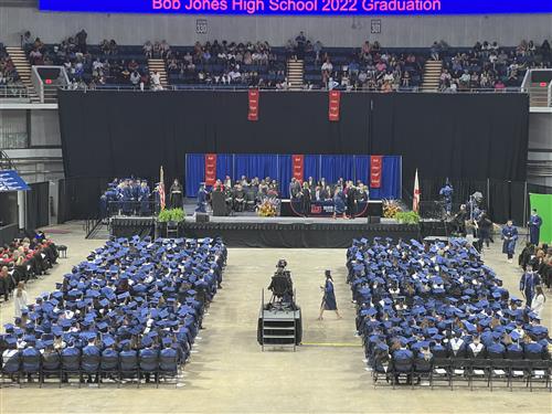 wide angle pic of bj graduates on floor